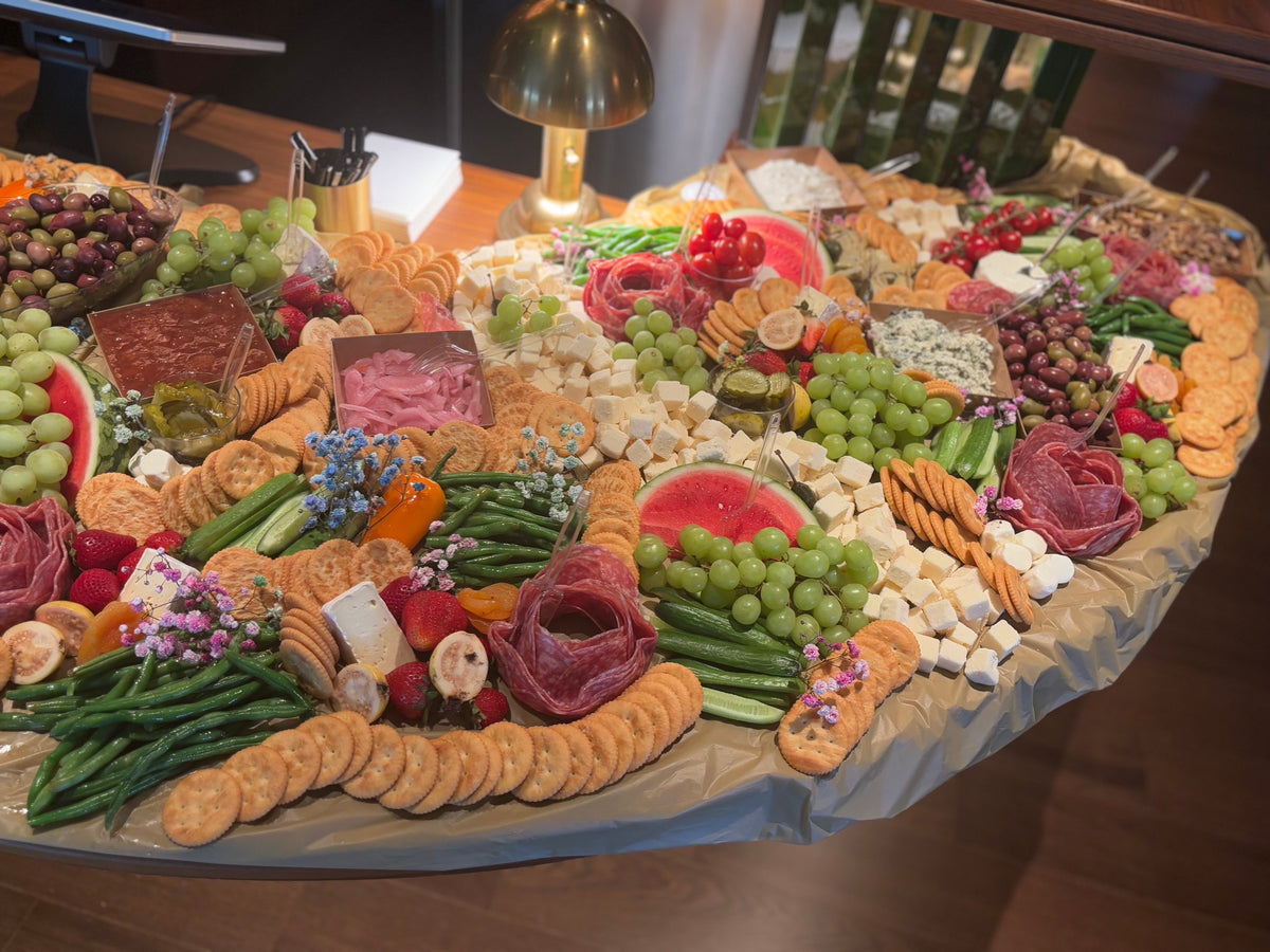 Grazing table installation styled across a DC bar